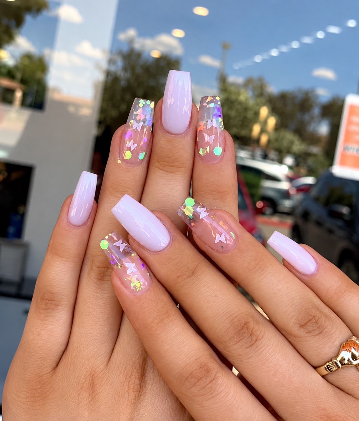 Lilac nails with translucent accent designs from the salon’s portfolio