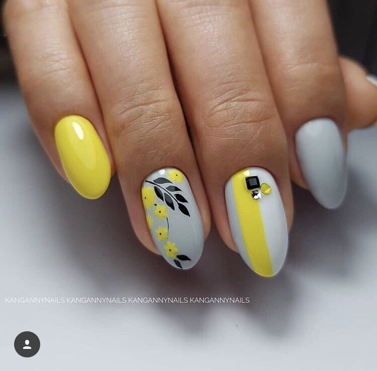 Yellow and pale gray floral nail inspiration, watermarked KANGANNYNAILS